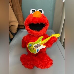 Sesame Street Rock and Rhyme Elmo Talking, Singing 14-inch plush toy 2020